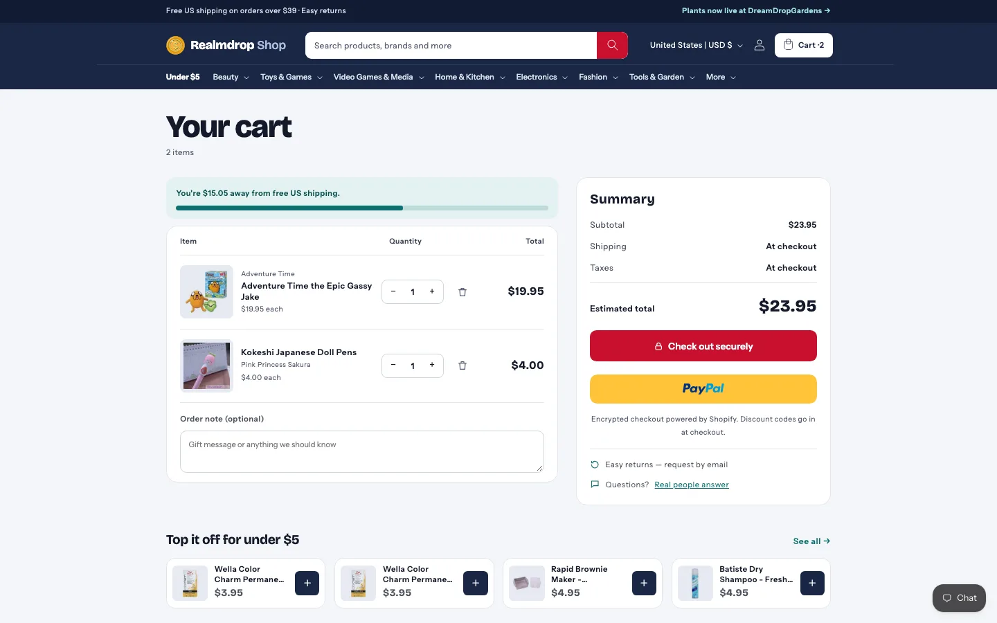 The cart page: free-shipping meter, items, order summary and a “Top it off for under $5” row