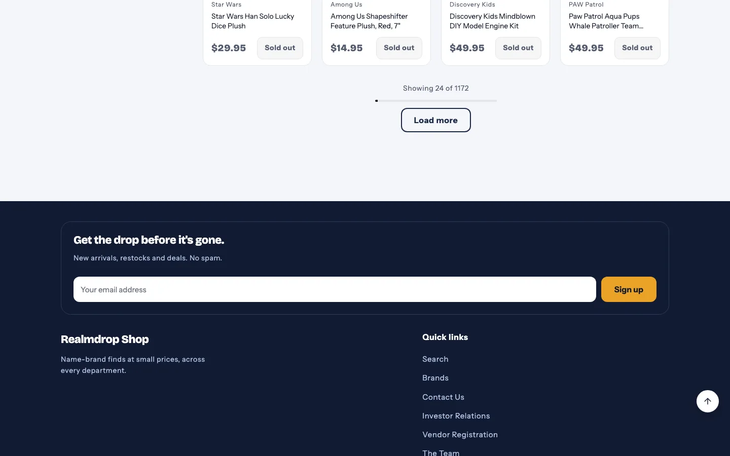 A long collection page scrolled to the footer, with the round back-to-top button in the corner